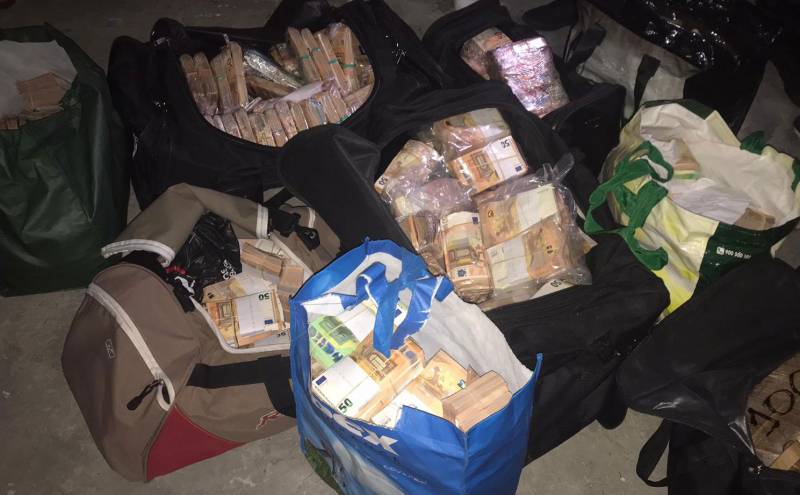 Bags of cash seized in global drug bust