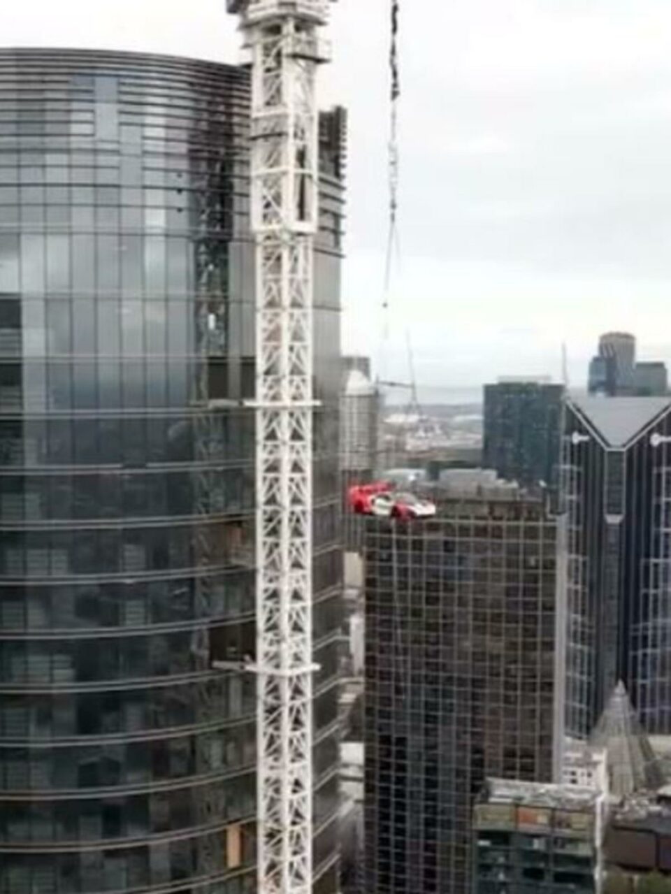 Block star has m McLaren craned into apartment
