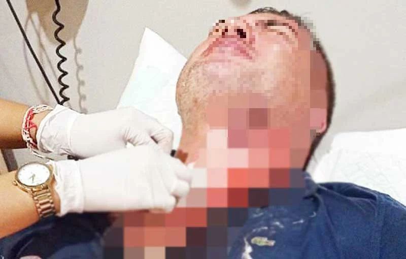 Injured man arrested; taken for treatment