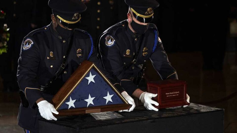 Family of slain cop accept rare honour