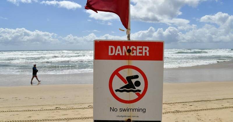 Third man pulled unresponsive from surf