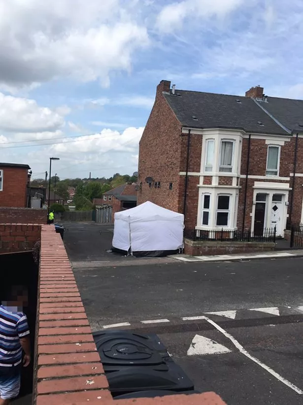 Man found unconscious in street fighting for life