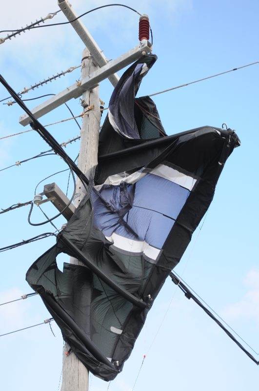 Horror as kitesurfer blown into power lines